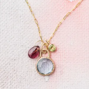 Sky Blue Topaz Necklace with Ruby and Peridot Charms